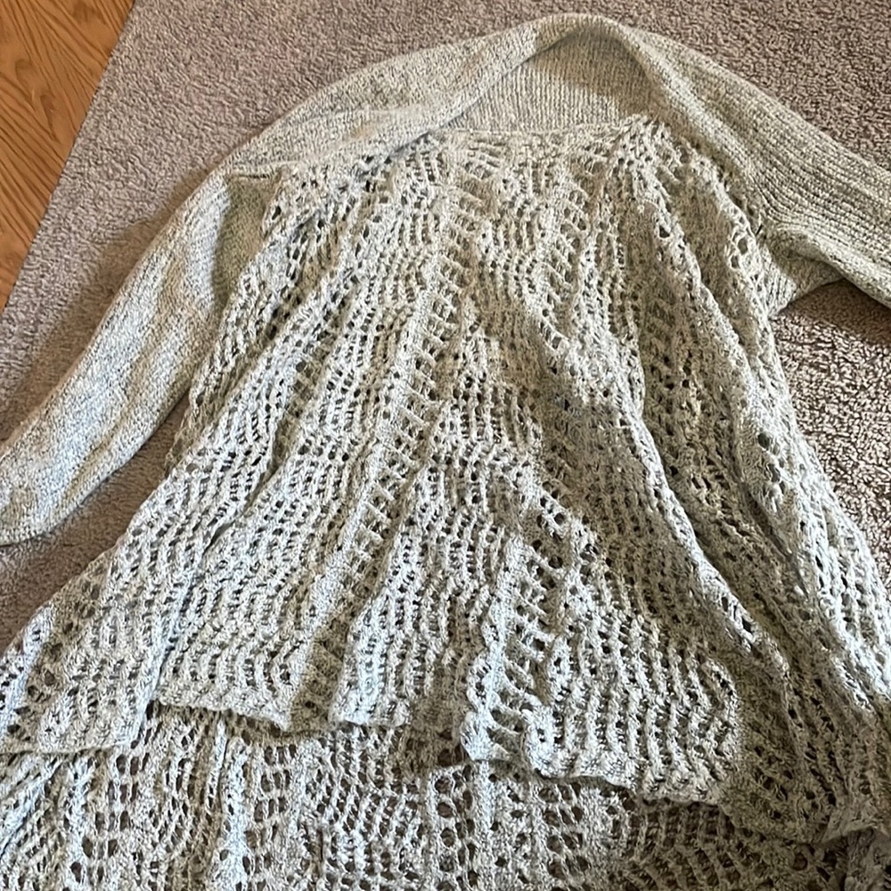 Light weight sweater high in back low in front